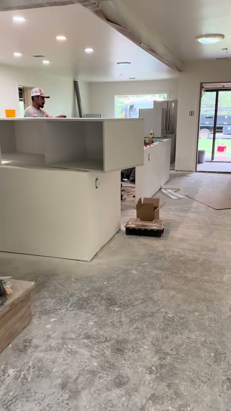 Open-plan tenant buildout with counters and new flooring