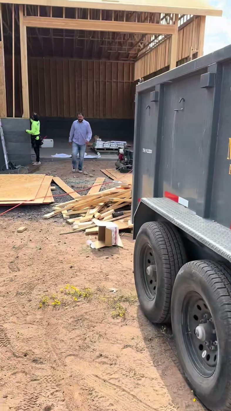 Commercial building site with wood framing and equipment